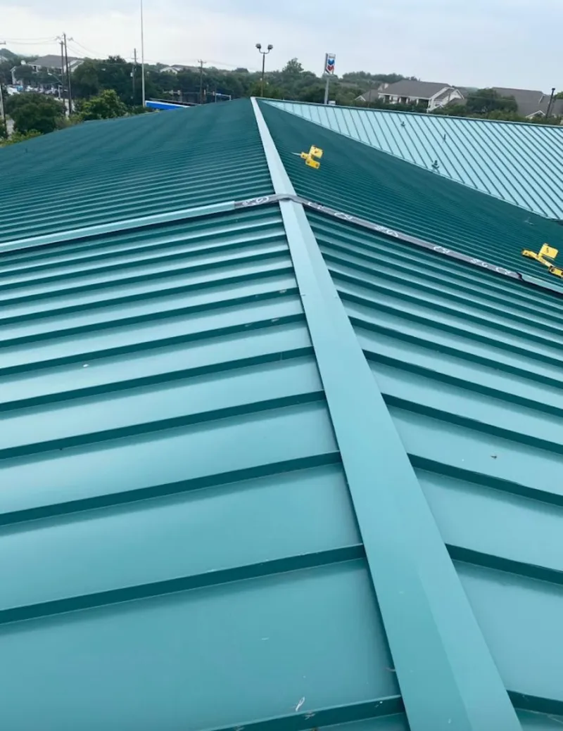 Green commercial metal roof ridge and valley for Metal Roof Repair in Earl