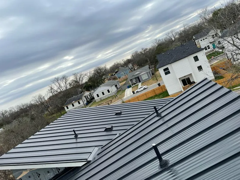 Standing seam metal roof panels with vents for Skylight Repair in Earl